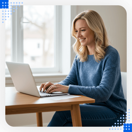 image of a woman doing taxes on her computer